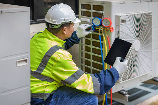 Professional Hvac Maintenance technician working in Dike, TX